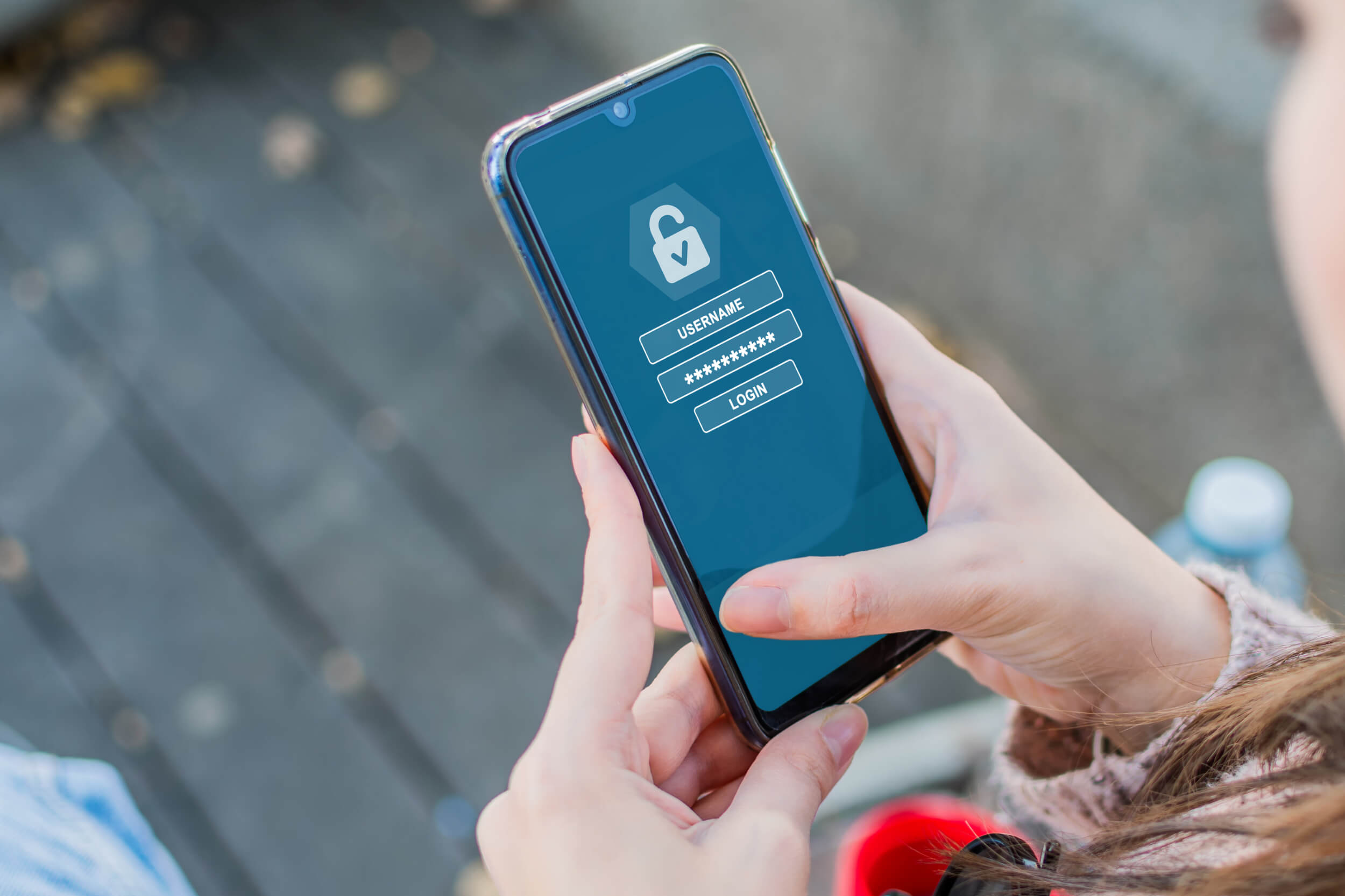 A phone with a login screen.